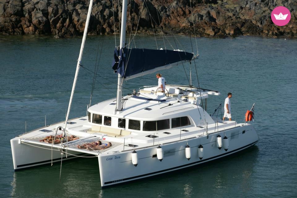Seize the sunset of Santorini with our Catamaran 